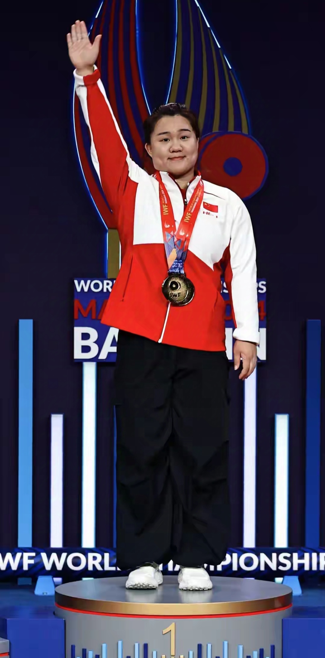 举重选手斗志昂扬,向成功发起冲刺 举重选手斗志昂扬,向成功发起冲刺